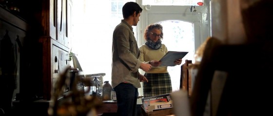 Ollie and Therese looking at the records