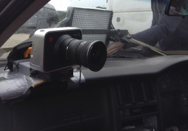 The Blackmagic, mounted on the dashboard with an old Hama suction mount, some cardboard, some gaffer tape, a wing and prayer